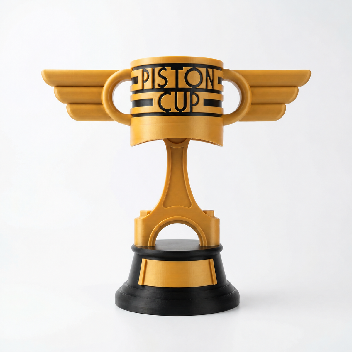Vista frontal neutra de la Copa Pistón estándar, dorada con base negra