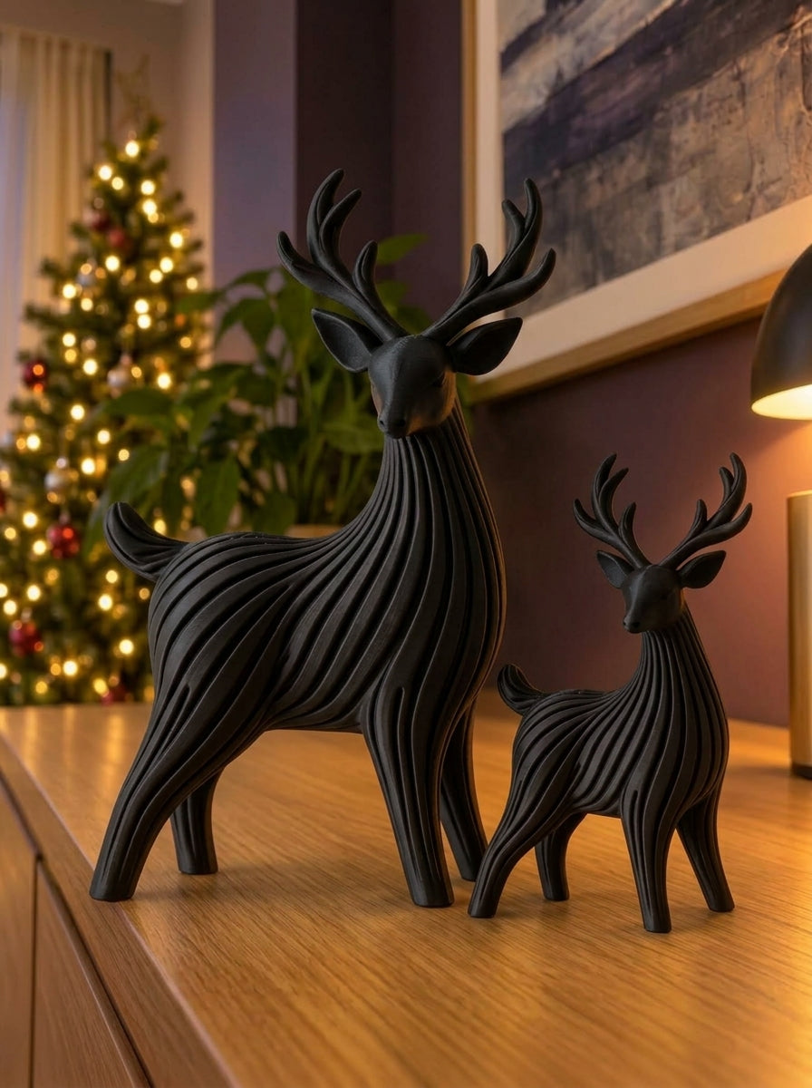 Dúo de renos navideños en negro, imagen referencial