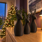 Trío de renos navideños en negro, imagen referencial
