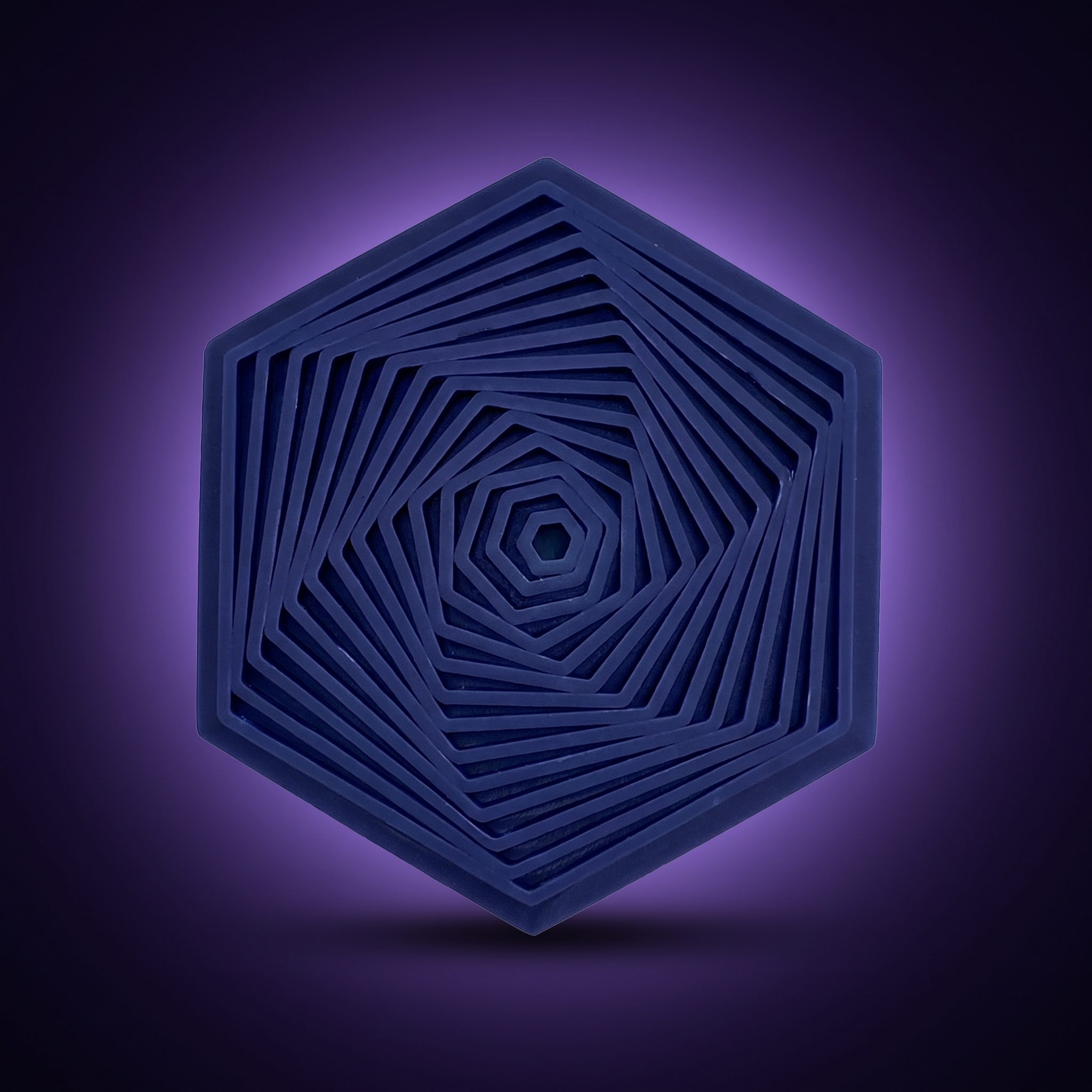 Hexágono Giratorio Antiestrés - color Azul marino, foto de estudio fondo morado