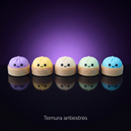 Mini dumplings antiestrés en 5 colores, fondo morado con frase Ternura antiestrés