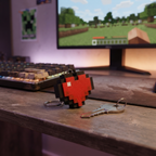 Llavero corazon pixel en escritorio gamer con setup Minecraft